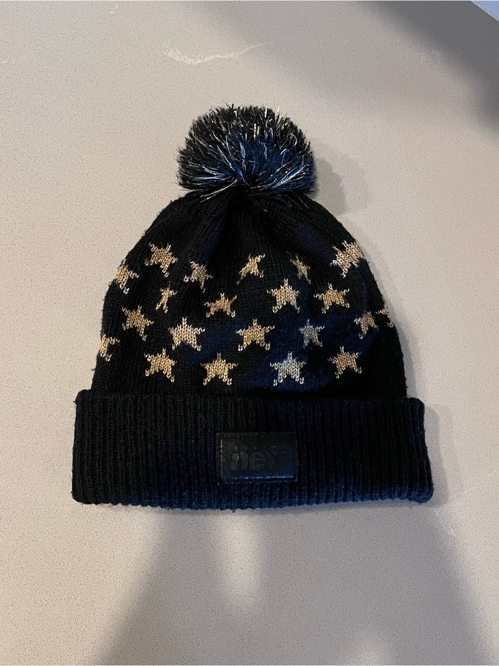 Neff Black Beanie with Gold Star Accents and Pom